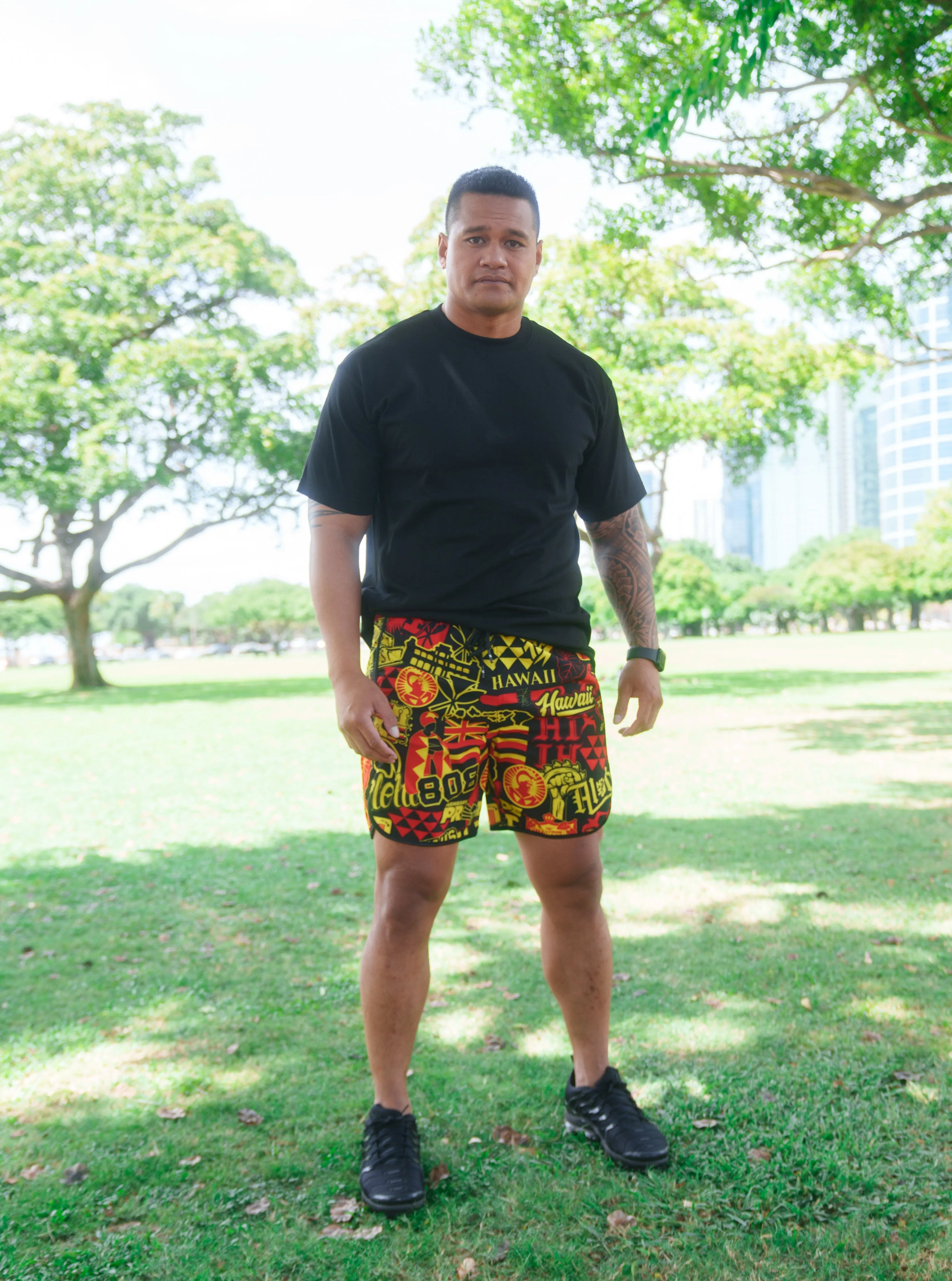 RED & YELLOW STICKERBOMB ALOHA FESTIVAL PERFORMANCE SHORTS